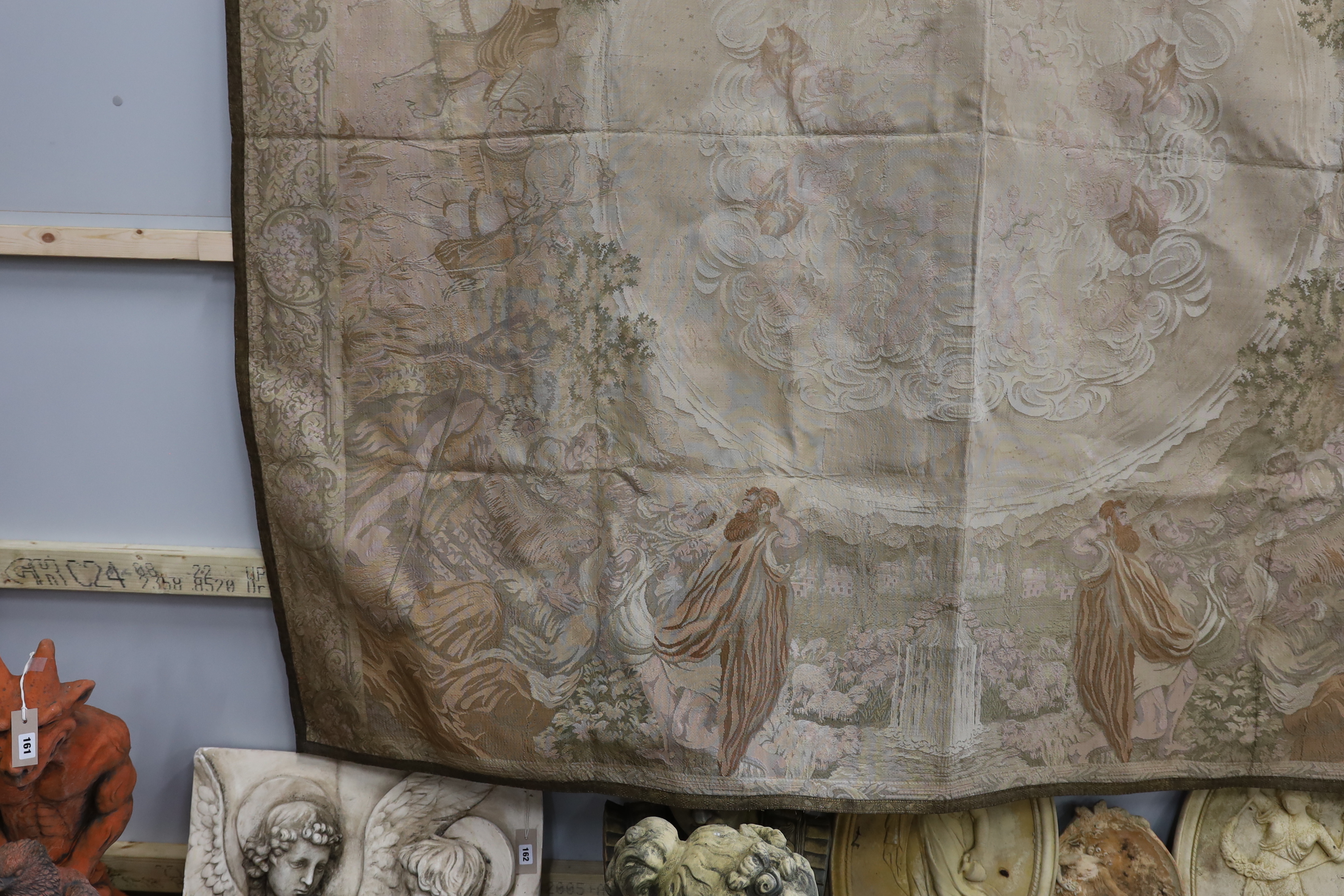 A metallic woven machine tapestry edged in metallic braiding, the tapestry depicting various scenes from the nativity, 225cm x 200cm